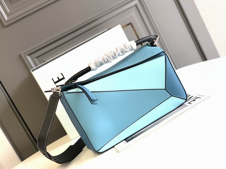 Loewe 061827 29x19.5x14c ss2 (1)