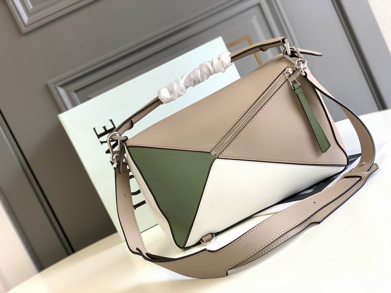 Loewe 061827 29x19.5x14c ss9 (8)